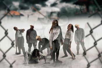 Zombies on construction site, monsters came alive, fog on background. Horror in city, creepy crawlies attack, doomsday apocalypse