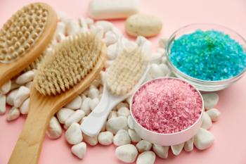 Skin care products creams and sea salt, macro view, pink background, nobody. Healthcare procedures concept, hygiene tools, healthy lifestyle