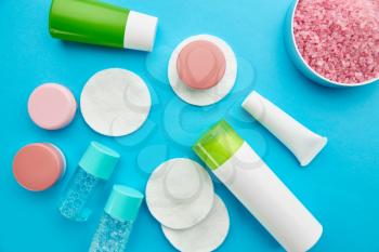 Care products on blue background, nobody. Healthcare procedures concept, fashion cosmetic. Healthcare procedures concept, hygiene tools, healthy lifestyle