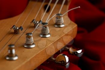 Electric guitar head closeup, nobody. String musical instrument, electro sound, electronic music, equipment for stage concert