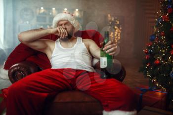 Bad Santa claus takes drugs with alcohol, nasty cocaine party, humor. Unhealthy lifestyle, bearded man in holiday costume, new year and alcoholism