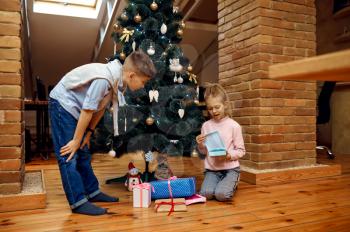 Children bloggers opens christmas gifts, vlog. Kids blogging in home studio, social media for young audience, online internet broadcast