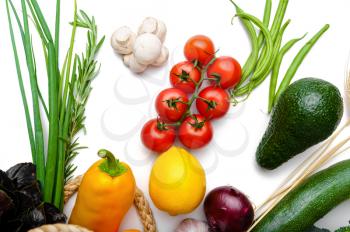 Fresh vegetables and fruits in paper package, isolated on white background. Organic vegetarian food, grocery products, healthy lifestyle concept