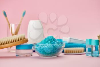 Oral and skin care products, macro view, pink background, nobody. Morning healthcare and toothcare procedures concept, hygiene
