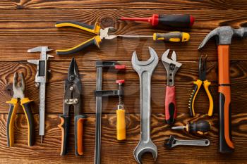 Workshop tools, closeup view, wooden background, nobody. Professional instrument, carpenter or builder equipment, woodworker tools