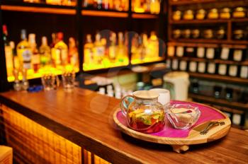 Hookah bar counter, tonic drinks, nobody. Shisha smoking equipment, traditional smoke culture, tobacco aroma for relaxation