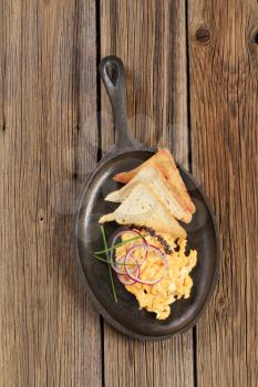 Breakfast  - Scrambled eggs and toasted bread 