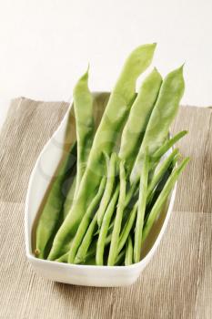 Fresh green beans in a rectangular dish