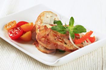 Pan fried chicken breast and crispy bread