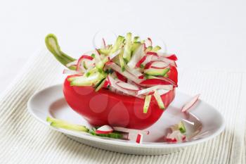 Red pepper filled with cucumber and radish salad
