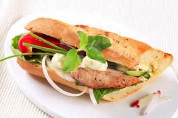 Grilled pork and vegetable sub sandwich