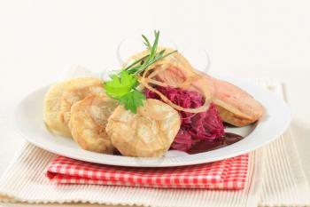 Roast pork with bread dumplings and red cabbage