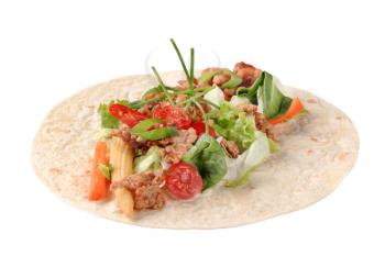 Tortilla with ground meat and vegetable filing