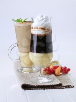 Two coffee drinks in tall glasses - still life