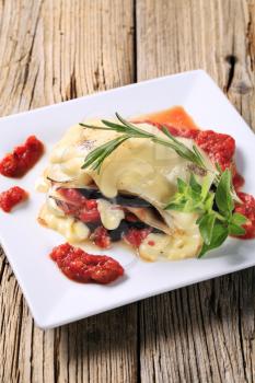 Aubergine and tomato lasagna topped with cheese sauce