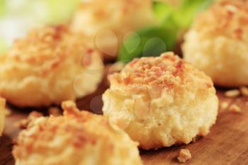 Coconut macaroons on a cutting board - detail