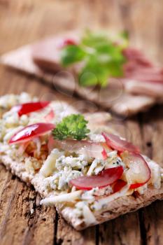 Crisp bread with blue cheese and pate