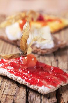 Crisp bread with jam, marmalade and cheese