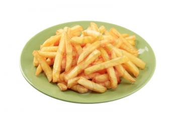 French fries on a green plate - cutout