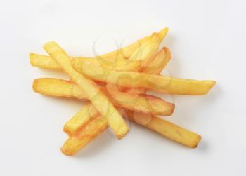  Heap of freshly fried French fries - studio