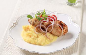 Roasted chicken drumstick and mashed potato