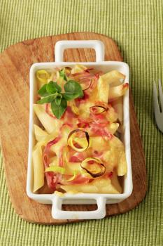 Pasta with ham and cheese in a casserole dish