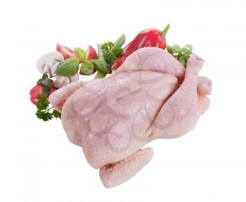 Raw chicken and fresh vegetables