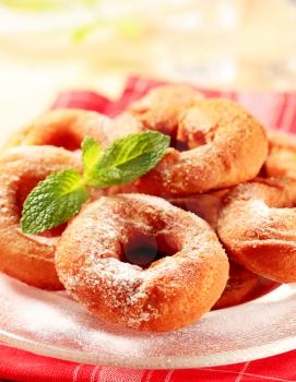 Deep-fried ring-shaped donuts