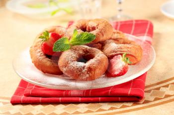 Deep-fried ring-shaped donuts