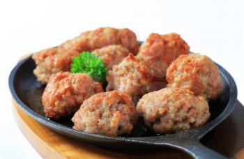 Meatballs on a cast iron pan