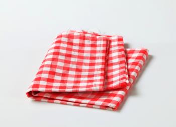 Checked red and white table linen