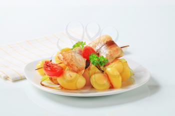 Fish skewer with boiled potatoes