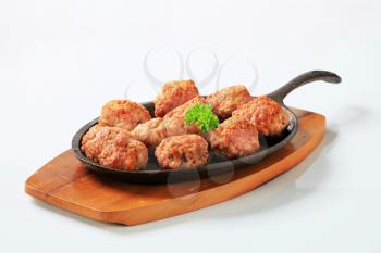 Meatballs on a cast iron pan
