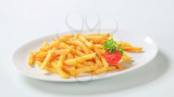 Portion of French fries on plate