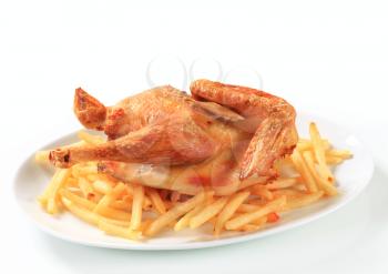 Crispy skin roast chicken with French fries