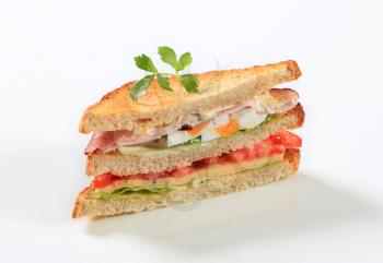Deli sandwich with ham, cheese, egg and veggies