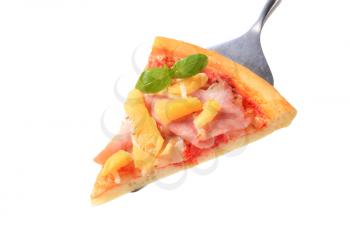 Slice of fresh baked Hawaiian pizza