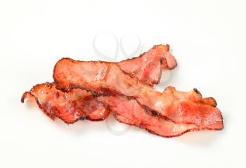 Strips of pan fried bacon