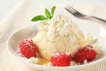 Raspberry dumpling with cottage cheese, sugar and butter