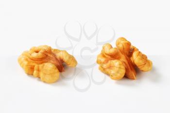 Two halves of fresh walnut