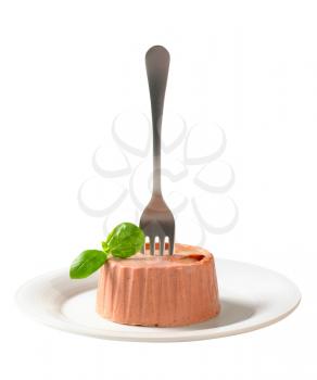 Smooth liver pate on plate