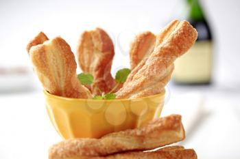 Puff pastry twists sprinkled with sugar 