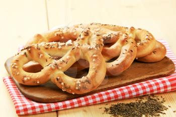 Soft pretzels with caraway seeds on top
