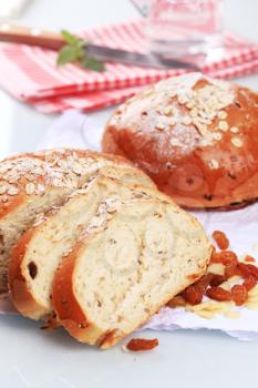 Loaves of sweet yeast bread topped with rolled oats