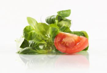 Lamb's lettuce and tomato wedge