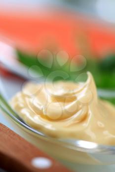 Swirl of salad dressing on a spoon