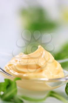 Swirl of creamy sauce on a spoon