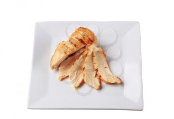 Slices of grilled chicken breast