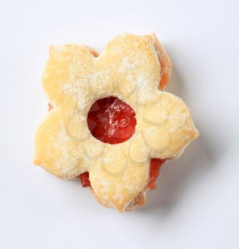 Jam filled cookie dusted with icing sugar