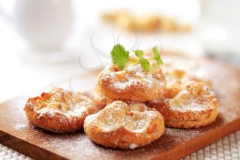 Mini cheese pastries sprinkled with icing sugar